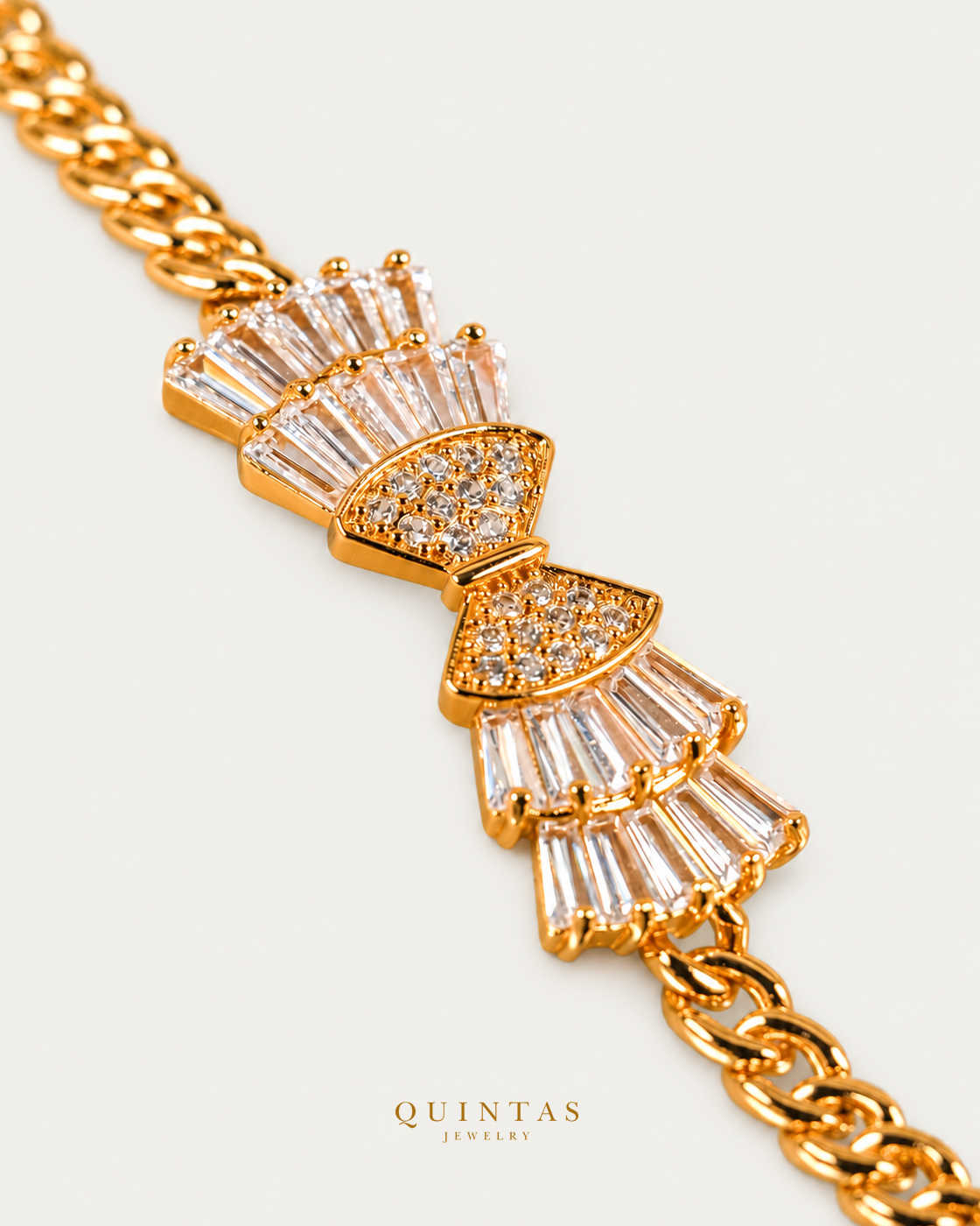 Diamond Ribbon Charm Bracelet — actual source-backed detail, unchanged macro crop, authentic canonical logo