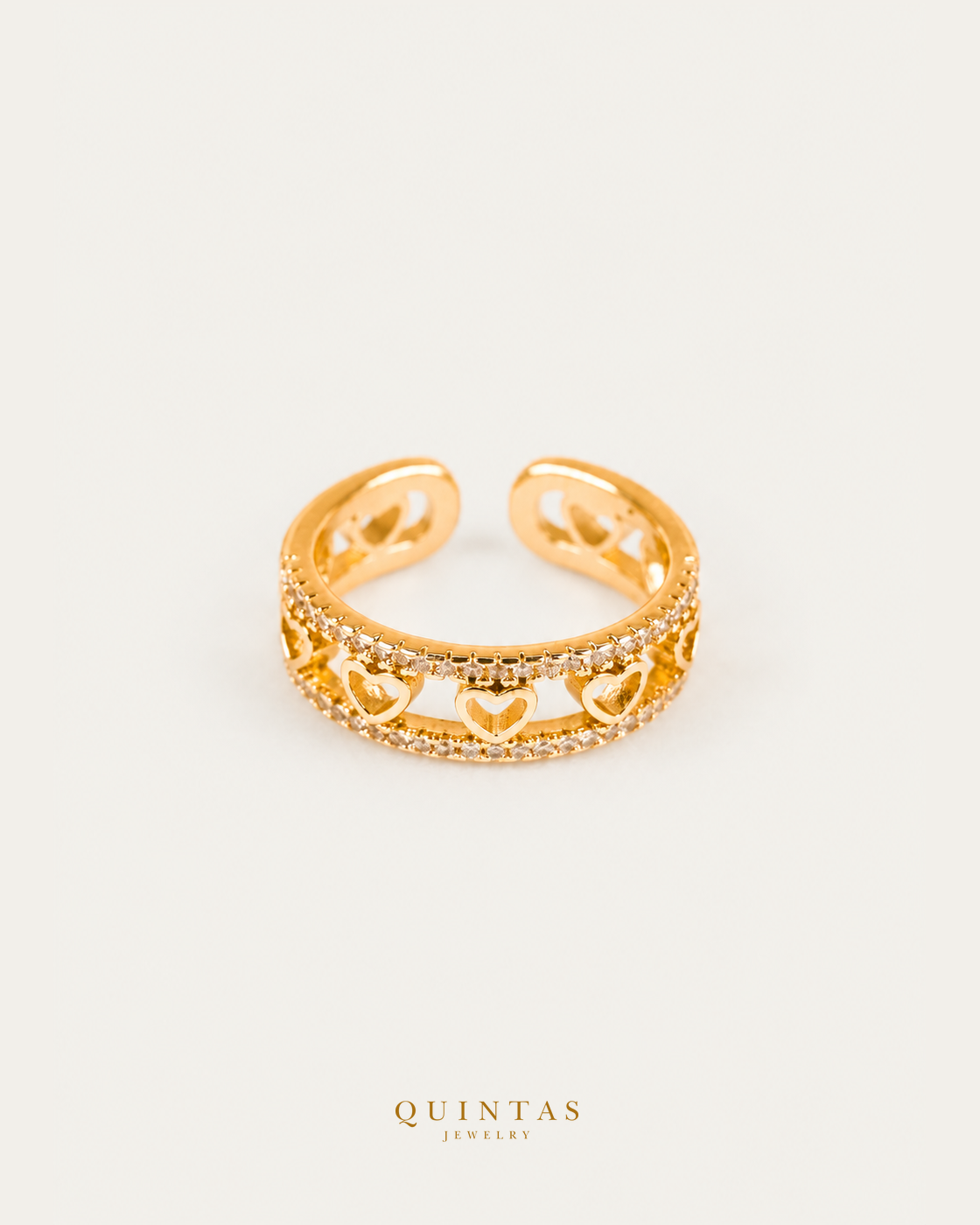 Valeria Heart Band Ring (Adjustable) — authentic gold QUINTAS JEWELRY logo, standalone lying main, smaller centered framing