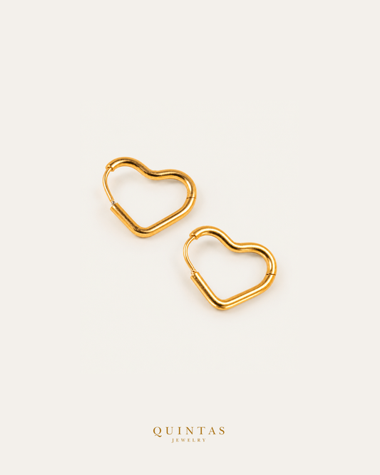 Amor Heart Hoop Earrings — source-backed complete hoop pair, source-backed main view, small balanced off-white composition and authentic canonical logo
