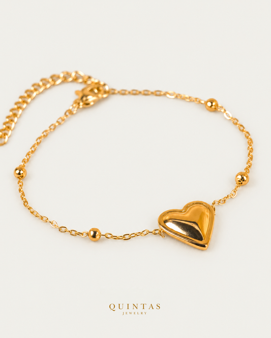 Everheart Golden Bracelet — source-verified main, original cropped extension and framing retained, authentic canonical gold logo; jewelry pixels unchanged