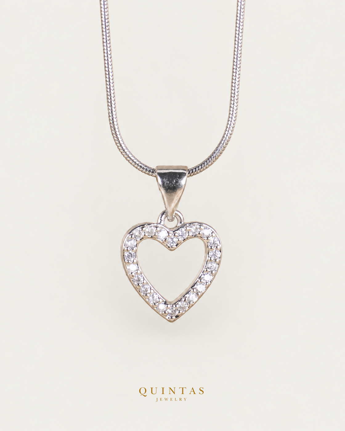 Arielle Silver Heart Necklace — exact source-supported main framing and jewelry unchanged, authentic canonical logo