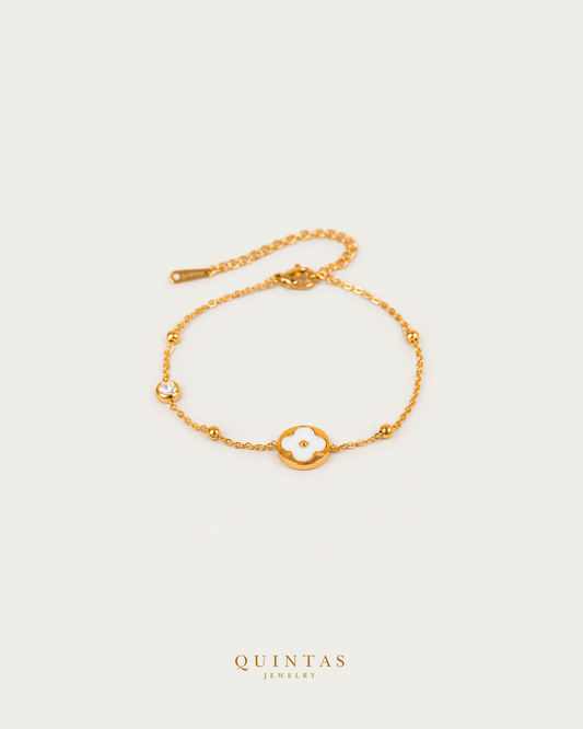 Camille Flower Charm Bracelet — source-verified bracelet main, smaller balanced off-white framing and authentic canonical logo