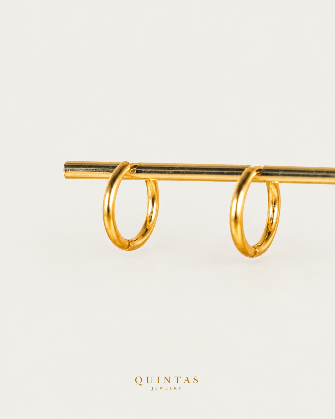 QUINTAS Classic Hoop Earrings — main view, canonical brand mark