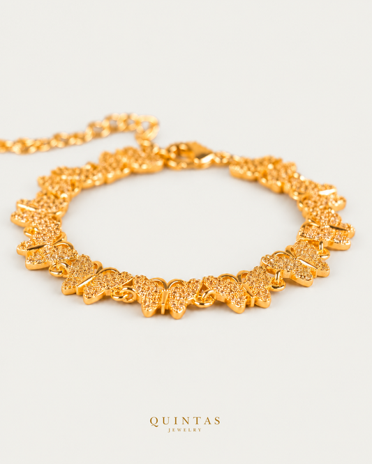 Charming Butterfly Bracelet — source-verified main with authentic canonical logo; original framing and cropped extension retained