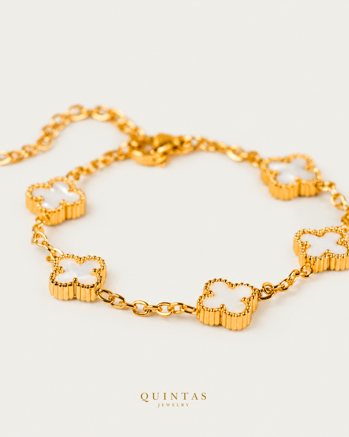 Clover Elegance Bracelet — WHITE physical-source main, original edge crop retained, canonical logo