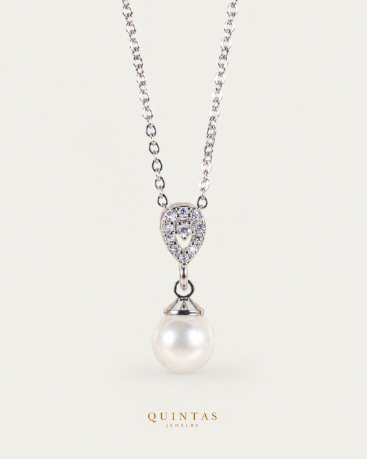 Althea Pearl Silver Necklace — exact source-supported main framing and jewelry unchanged, authentic canonical logo