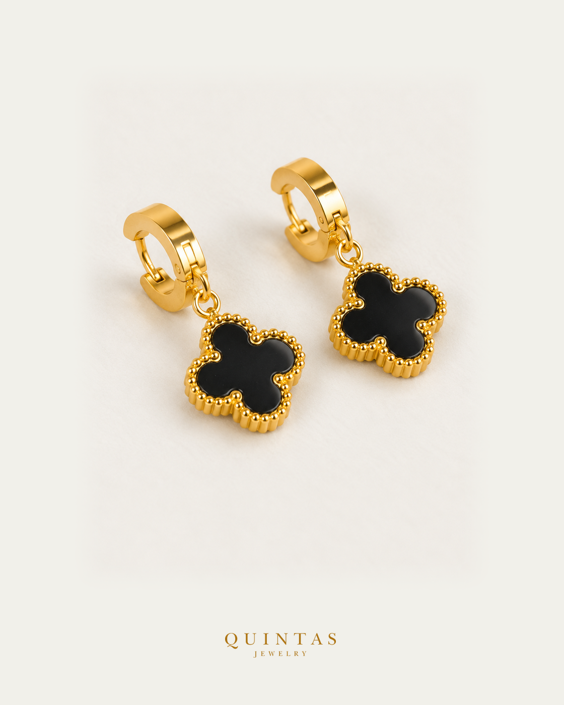 Clover Hoop Earrings Black — matching pair, lying complementary angle, Quintas Jewelry