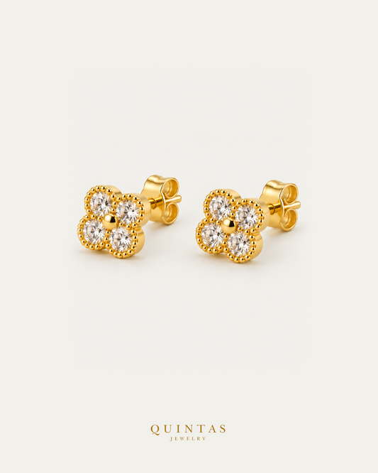 Crystal stud earrings pair, main angle with visible pushback stems on off-white