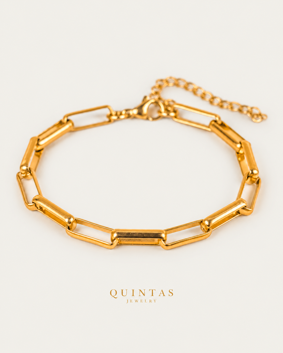 Muse Link Bracelet — gold bracelet, front hero, neutral greige background