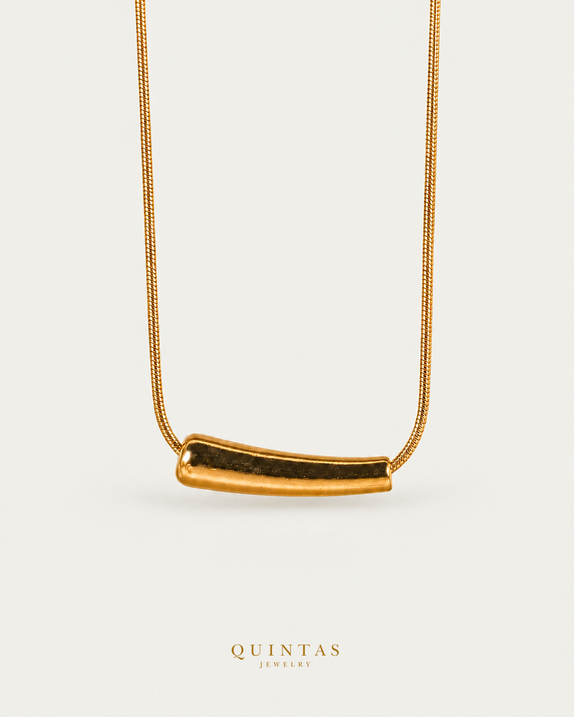 Aure Bar Necklace — gold snake chain, hero view, canonical Quintas logo