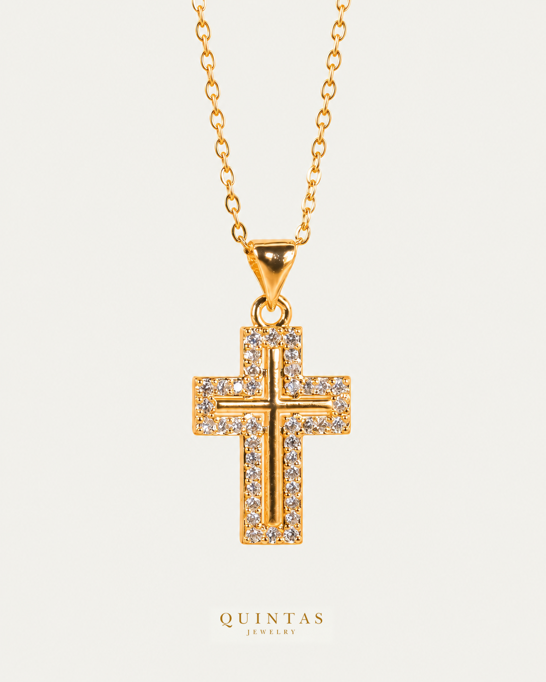 Graceful Cross Necklace — source-verified cable front view, off-white background, canonical gold logo