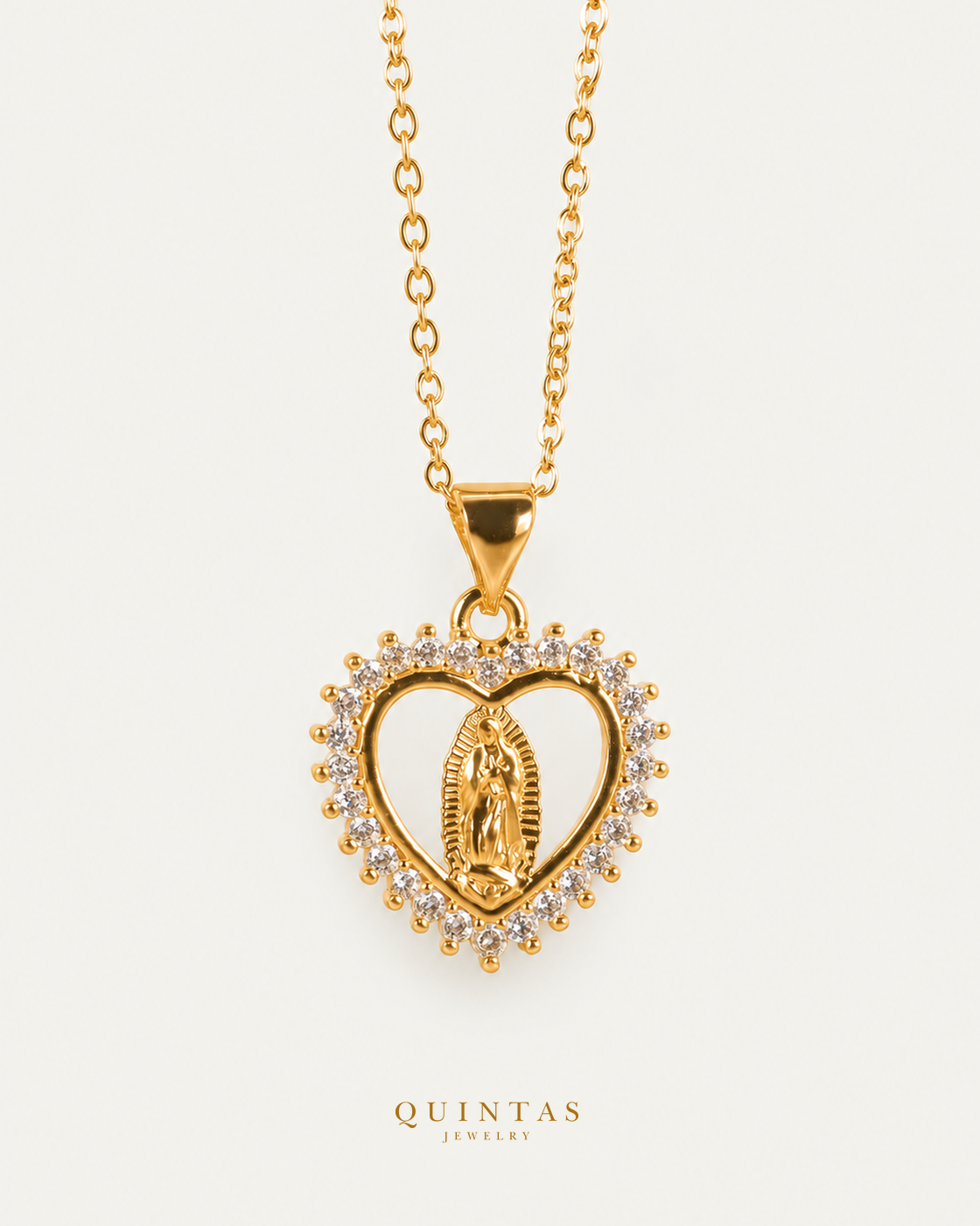 Heart of Mary Necklace on gold cable chain, hero angle, neutral greige