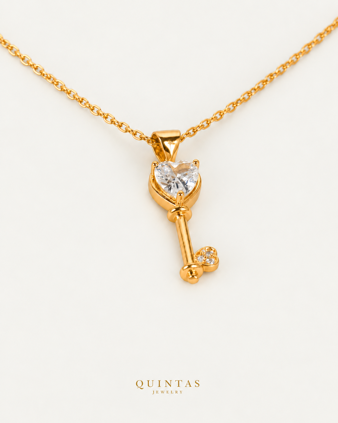 Key Diamond Heart Necklace gold cable chain, companion view, canonical Quintas logo