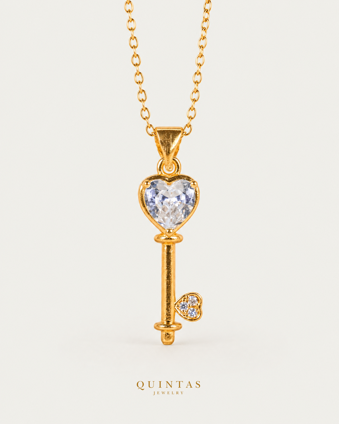 Key Diamond Heart Necklace gold cable chain, main view, canonical Quintas logo