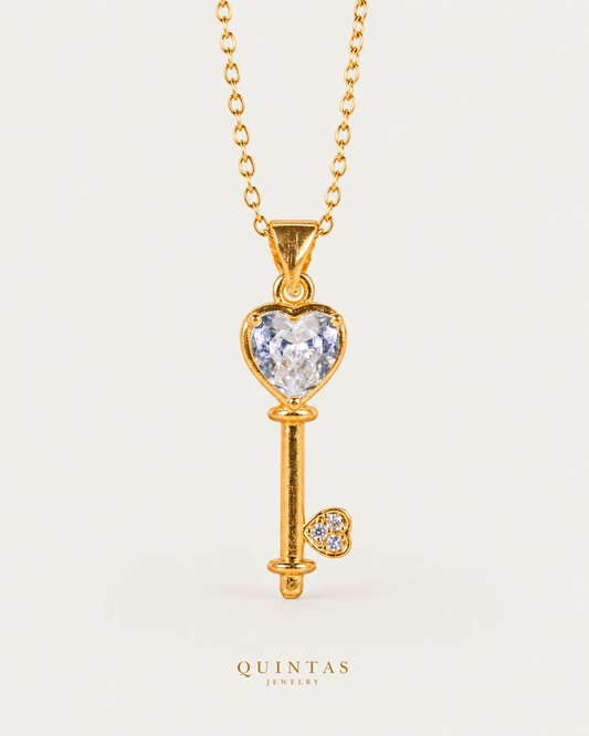 Key Diamond Heart Necklace gold cable chain, main view, canonical Quintas logo