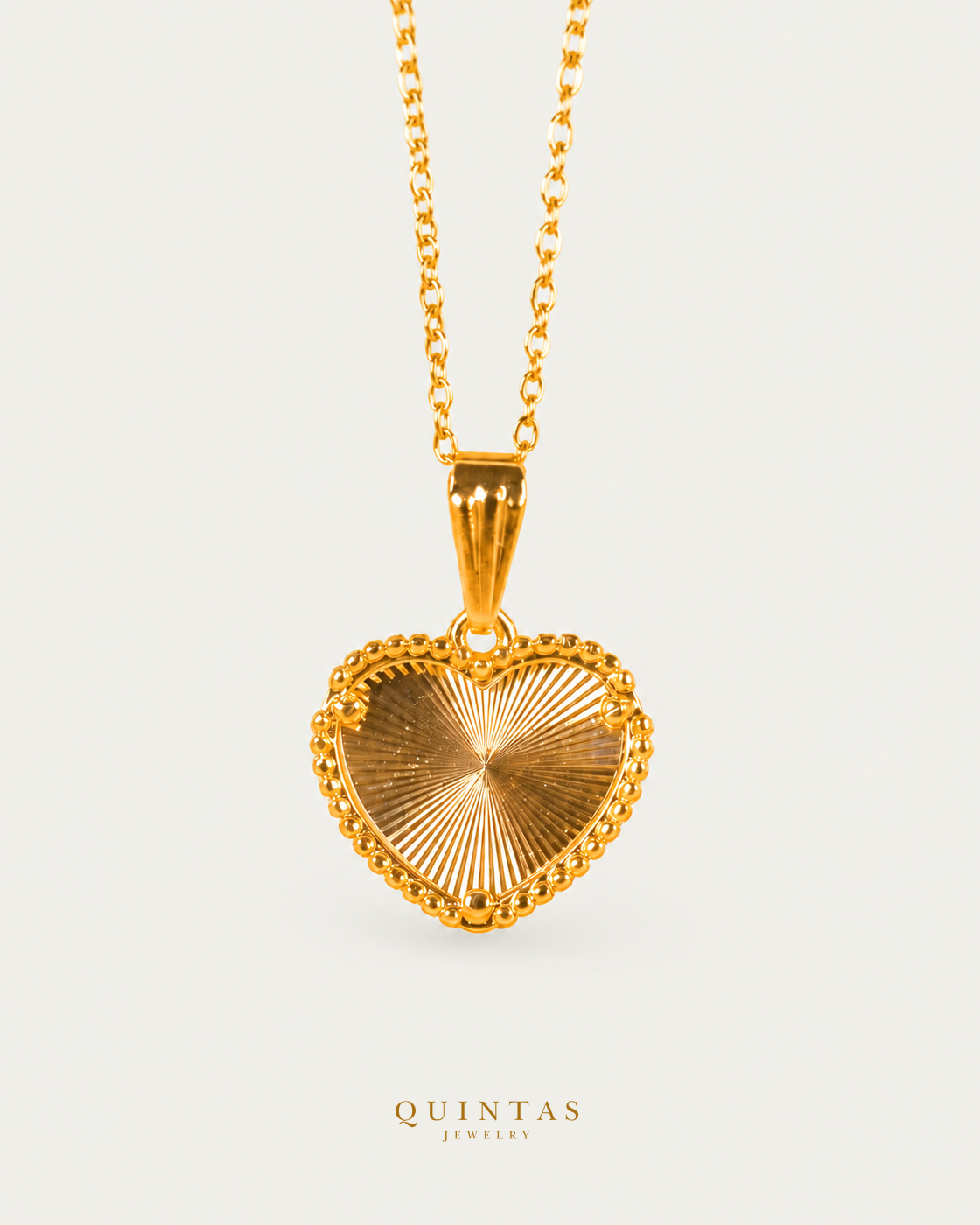 Solana Heart Necklace hero with canonical Quintas Jewelry logo