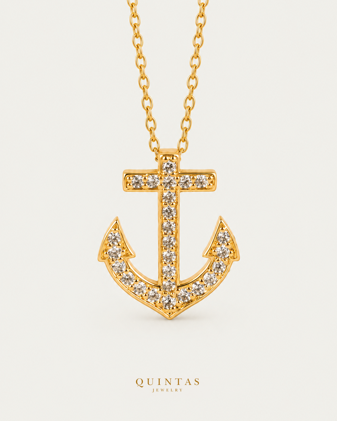 Anchor Charm Necklace hero with canonical Quintas Jewelry logo
