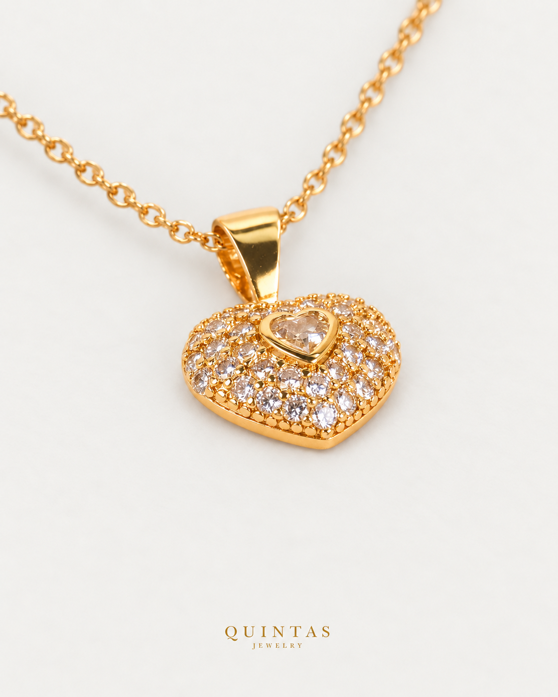 Sparkling Heart Necklace gold cable chain companion view, canonical Quintas logo