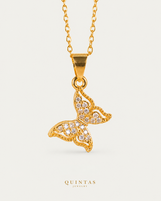 Marie Butterfly Tail Necklace gold cable chain main view, canonical Quintas logo