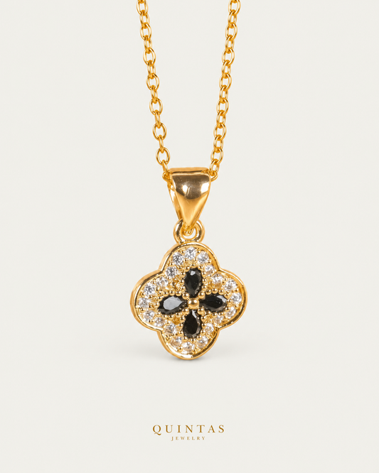 Aurea Black Clover Necklace cable chain hero angle on neutral greige