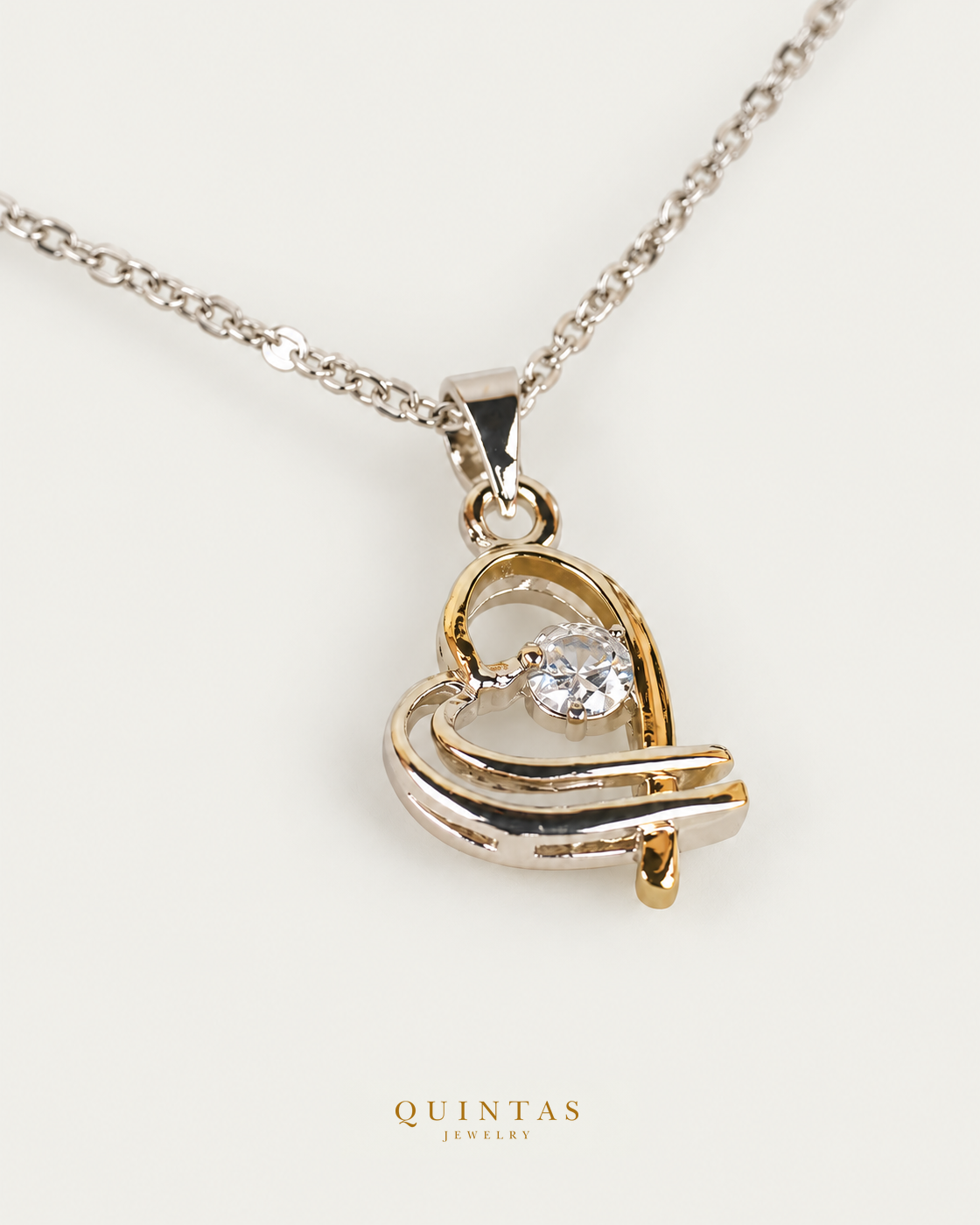 Interwined Hearts Silver Necklace, existing silver cable view, canonical Quintas logo