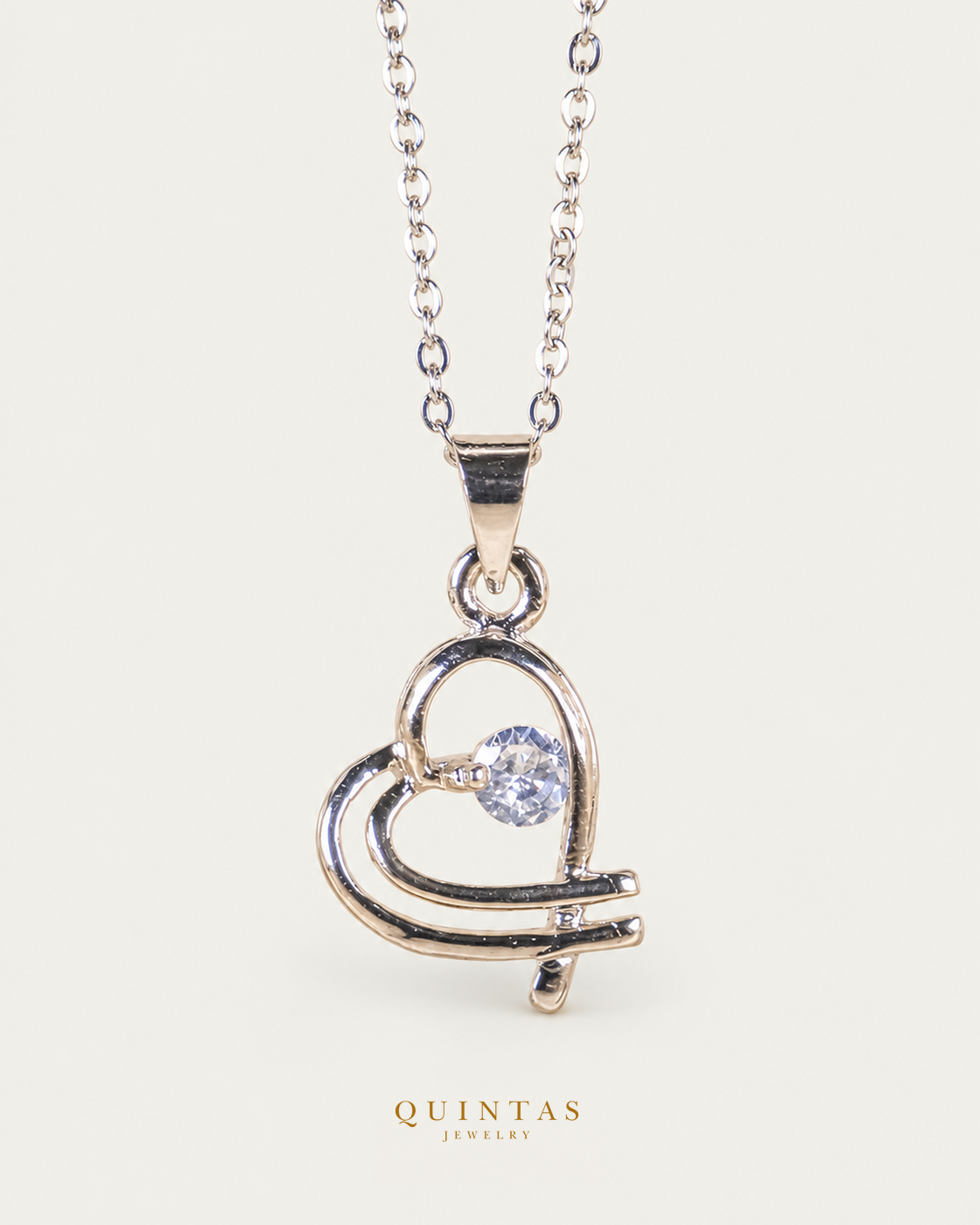Interwined Hearts Silver Necklace, existing silver cable view, canonical Quintas logo
