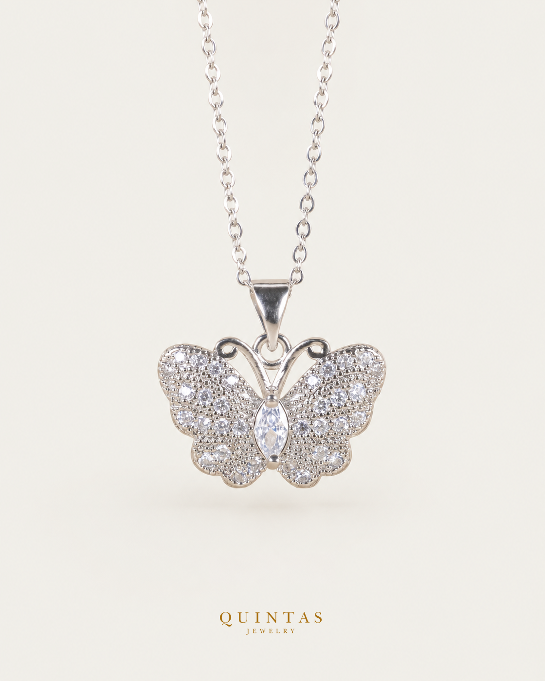 Jane Butterfly Silver Necklace, existing silver cable view, canonical Quintas logo
