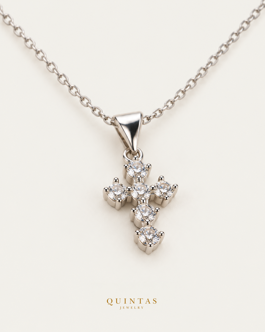 Mini Iced Cross Silver Necklace, existing silver cable view, canonical Quintas logo