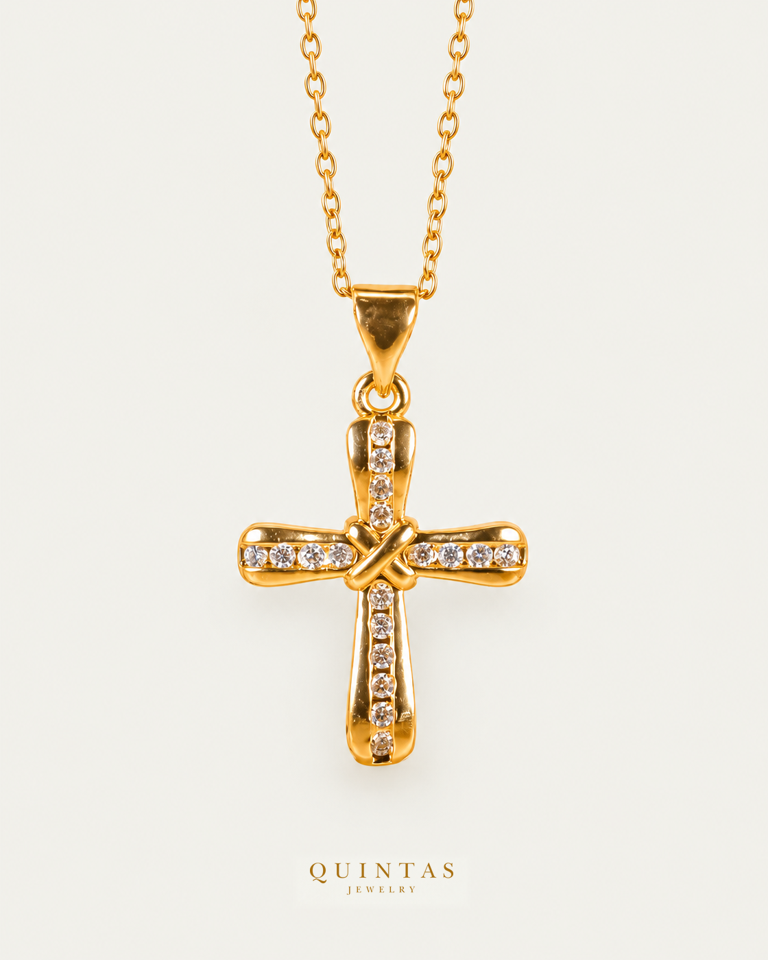 Knot Cross Necklace — source-verified cable front view, off-white background, canonical gold logo