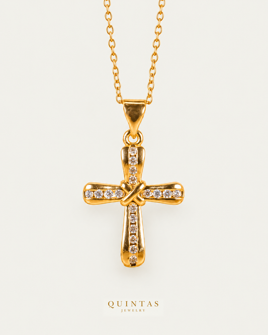 Knot Cross Necklace — source-verified cable front view, off-white background, canonical gold logo