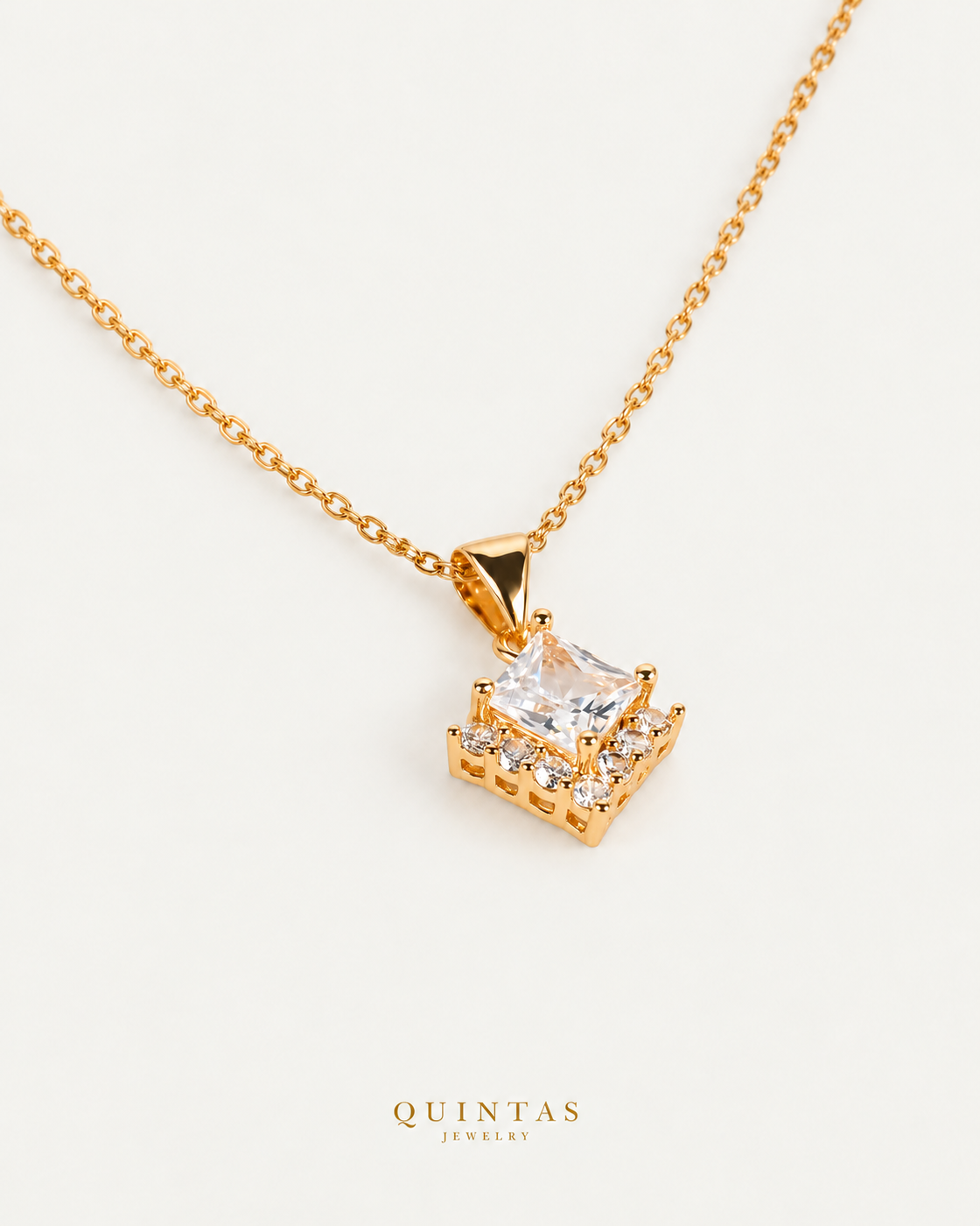 Crystal Prism Necklace, gold cable chain, oblique view; canonical Quintas Jewelry logo