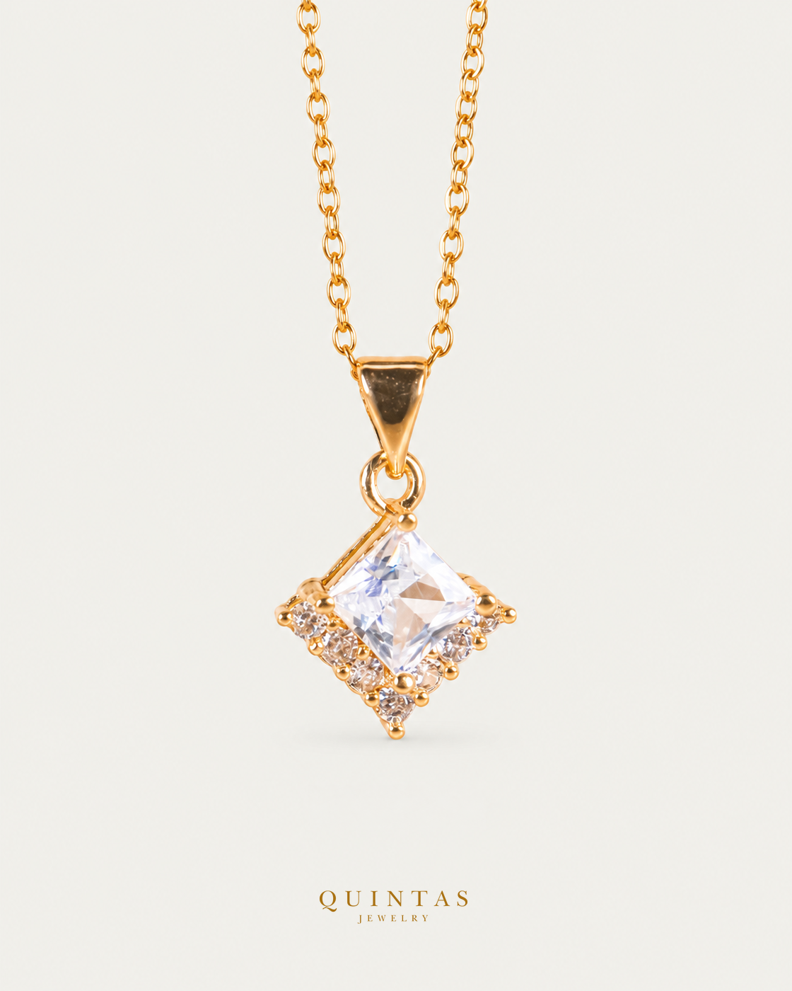 Crystal Prism Necklace, gold cable chain, front view; canonical Quintas Jewelry logo