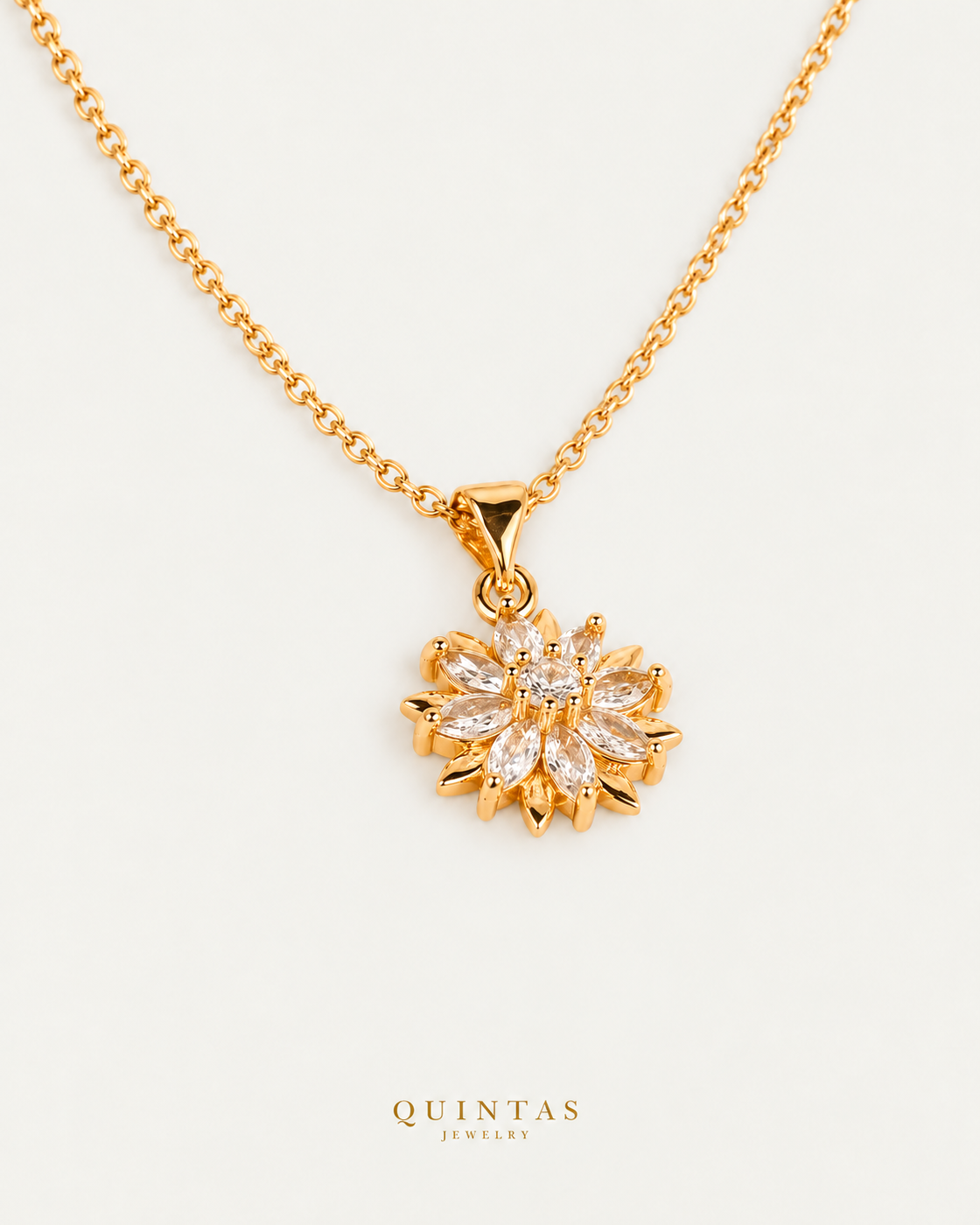 Floral Bloom Necklace, gold cable chain, oblique view; canonical Quintas Jewelry logo