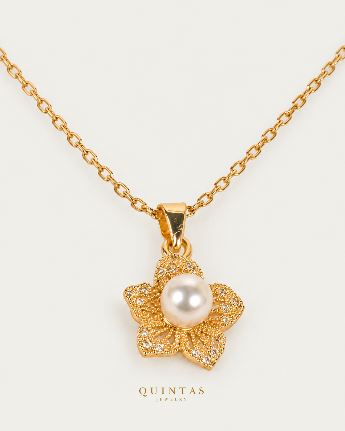 Lunara Flower Bloom Necklace companion with canonical Quintas Jewelry logo