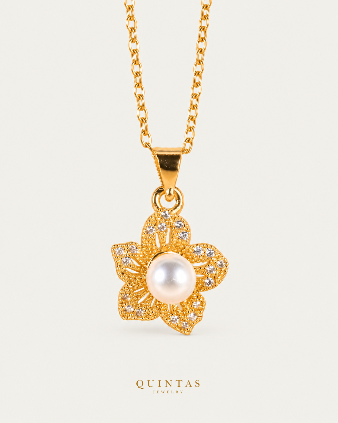 Lunara Flower Bloom Necklace hero with canonical Quintas Jewelry logo