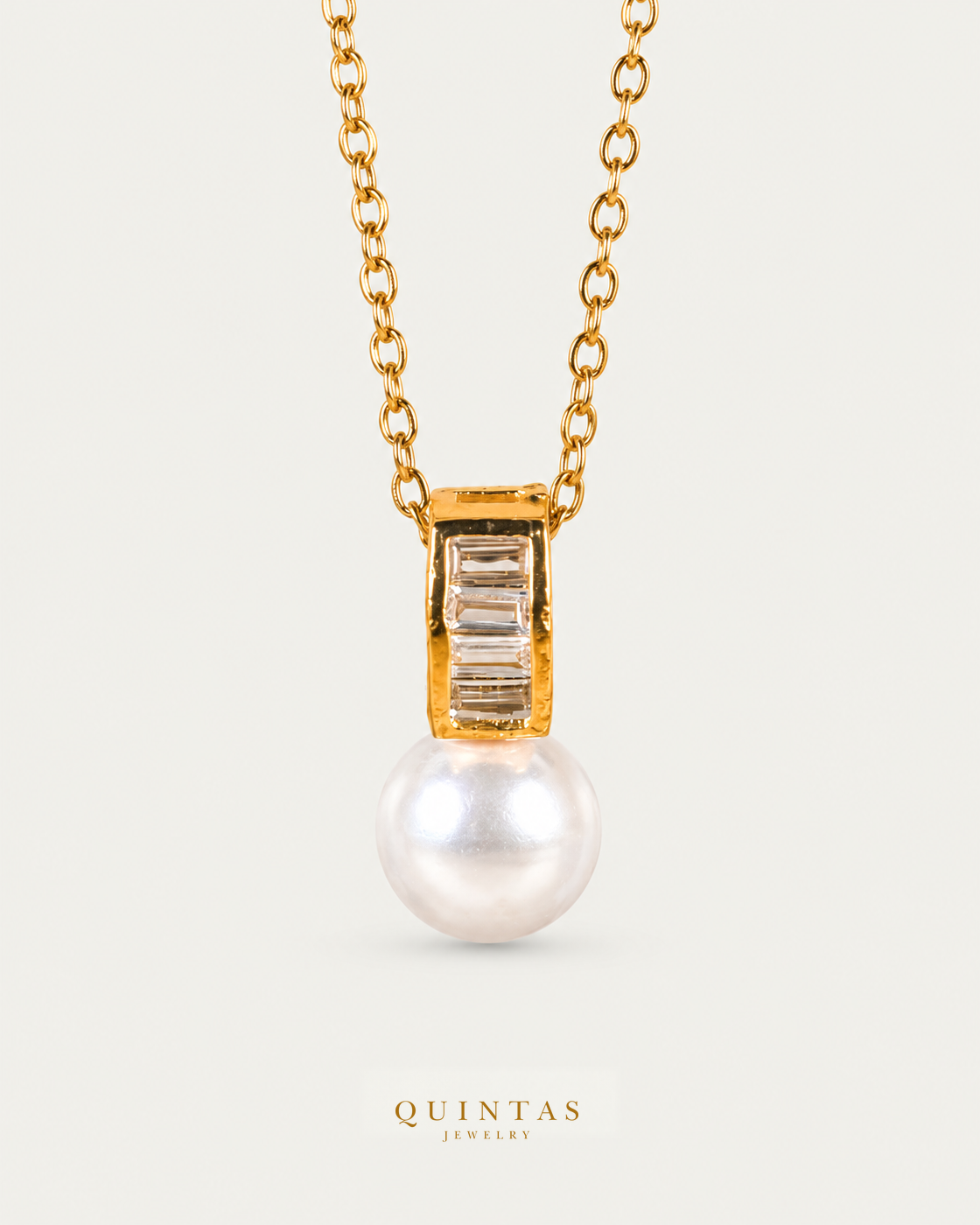 Lustra Pearl Drop Necklace — source-verified cable front view, off-white background, canonical gold logo