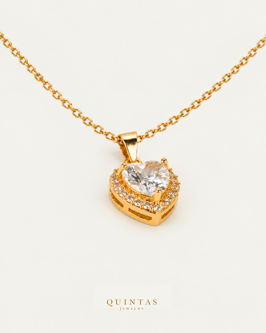 Arielle Heart Diamond Necklace — source-verified cable oblique view, off-white background, canonical gold logo