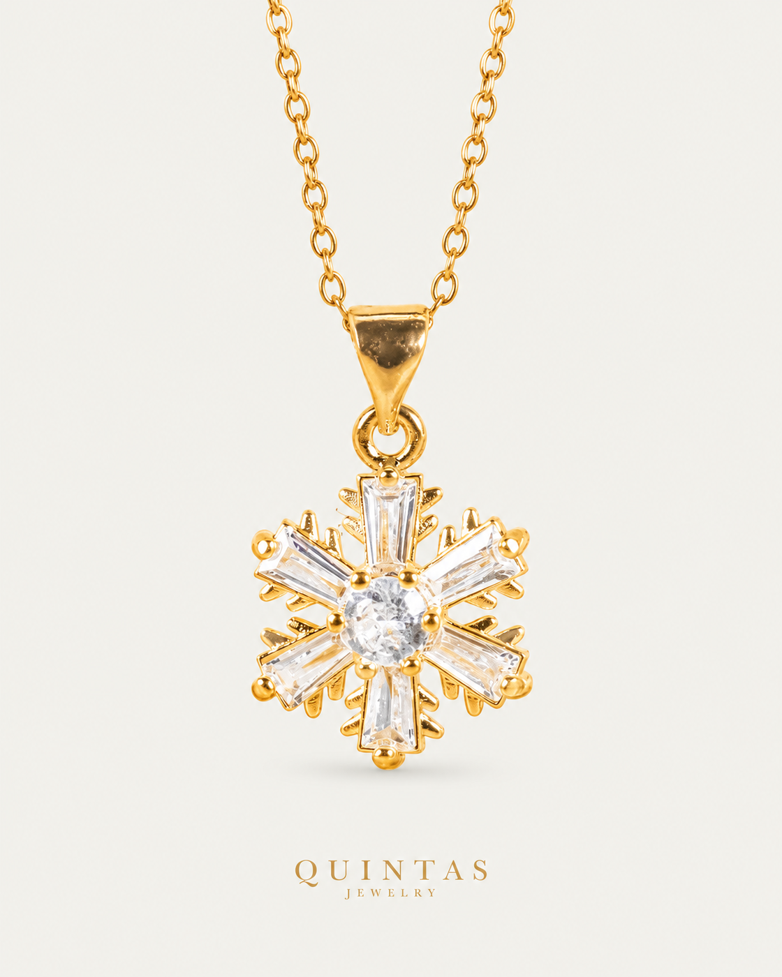Iced Snowflake Necklace cable chain hero angle on neutral greige