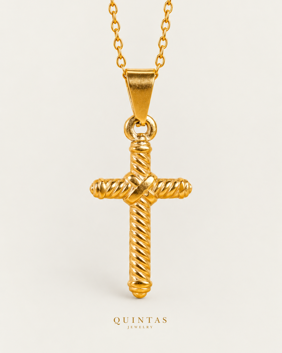 Callisto Rope Cross Necklace, gold cable chain, front view; canonical Quintas Jewelry logo