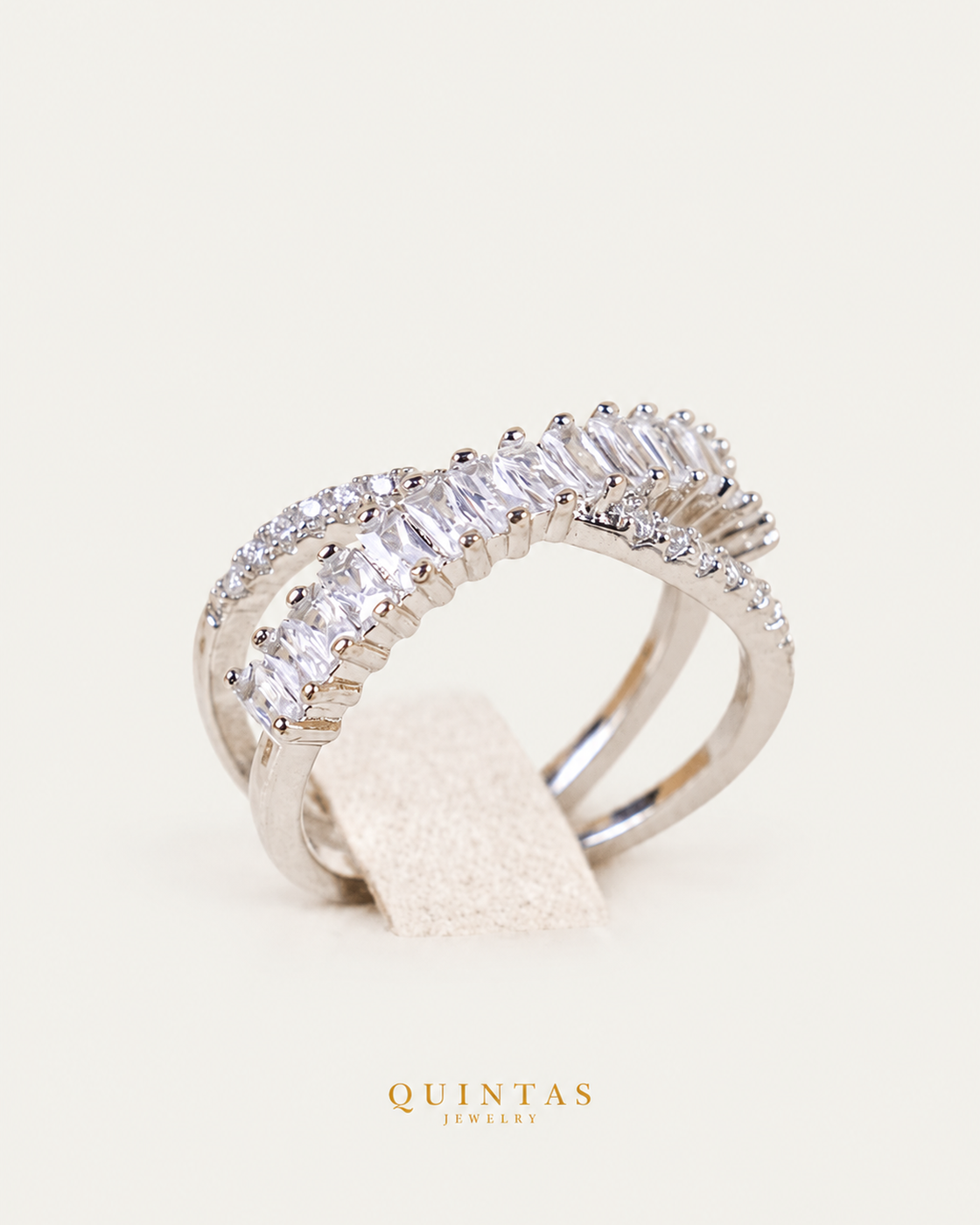 Elena Baguette Silver Infinity Ring (Adjustable), upright source-backed view