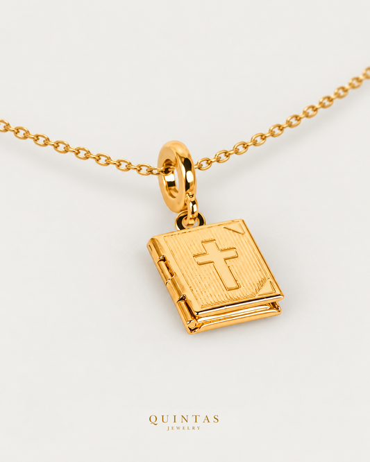 Sacred Book Locket Necklace — source-verified cable main view, off-white background, canonical gold logo