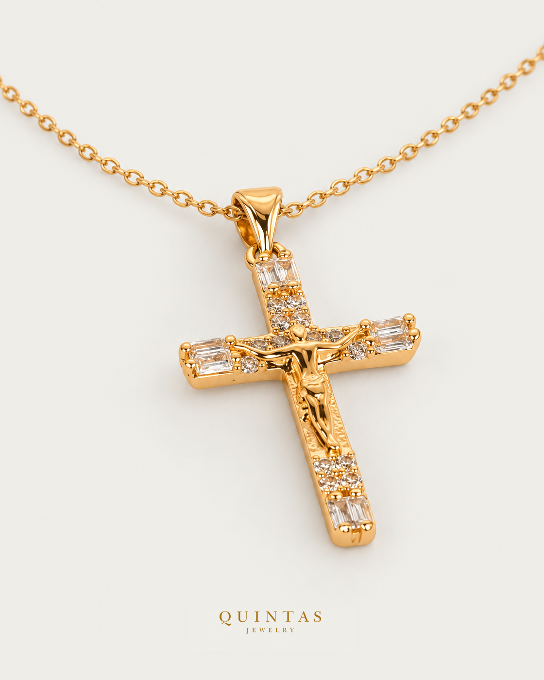 Veritas Crucifix Necklace Gold Cable Chain companion angle on neutral greige