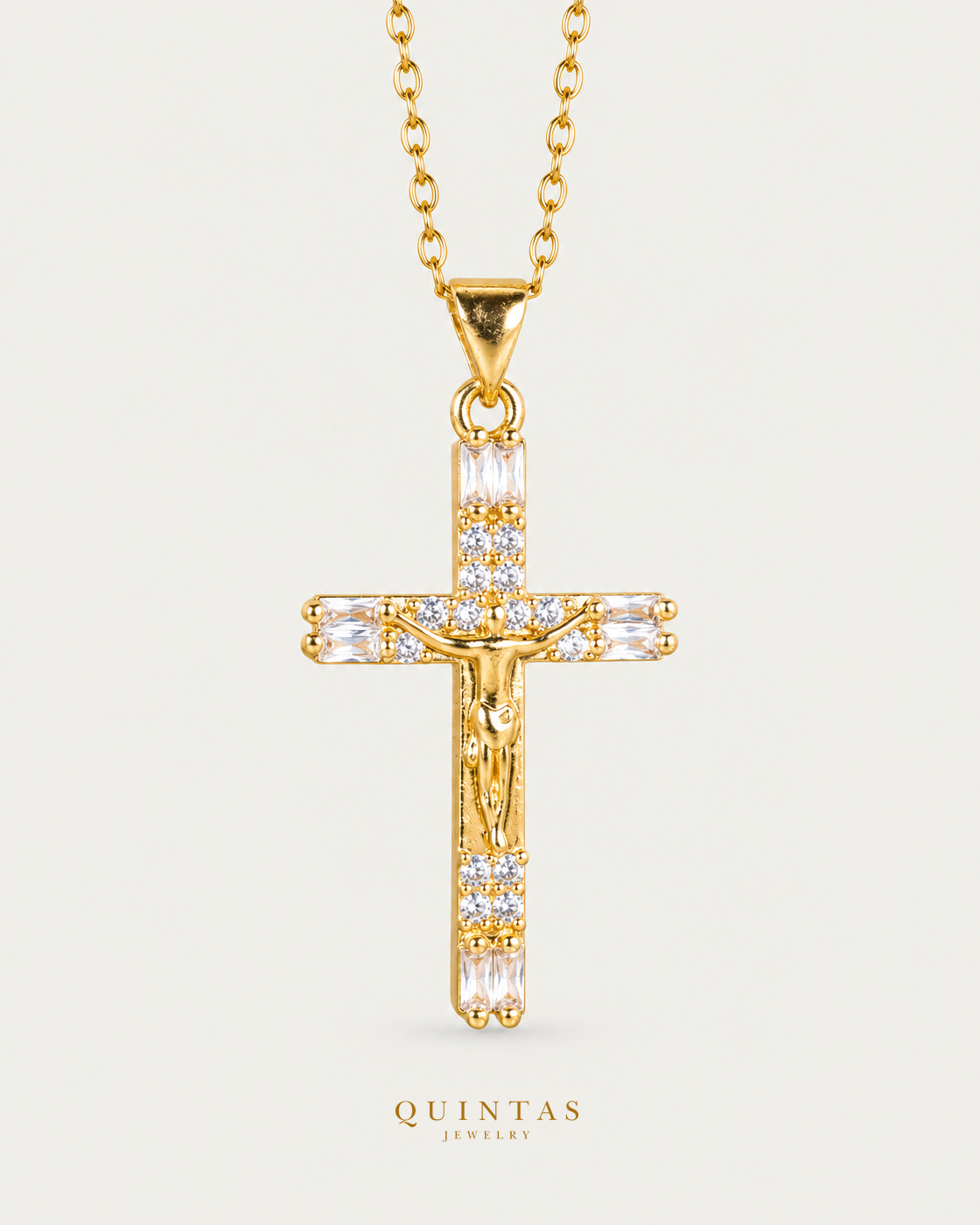 Veritas Crucifix Necklace Gold Cable Chain hero angle on neutral greige
