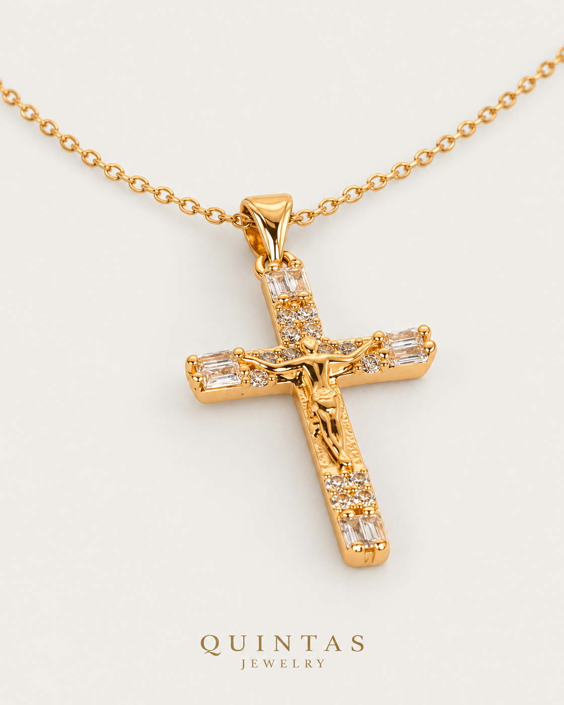Veritas Crucifix Necklace Gold Cable Chain companion angle on neutral greige