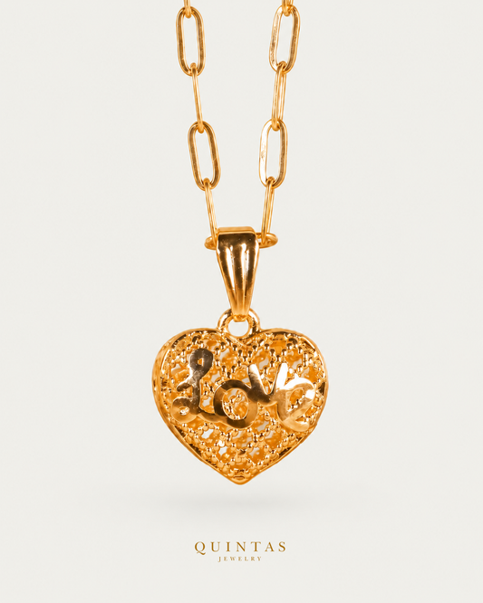 Written in Love Necklace — source-verified paperclip front view, off-white background, canonical gold logo