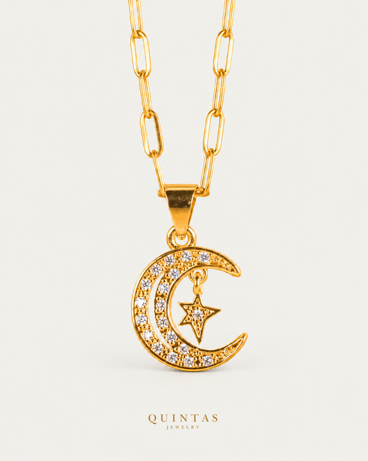 Astrielle Moonfall Necklace Paperclip Chain hero angle on neutral greige; canonical Quintas Jewelry logo