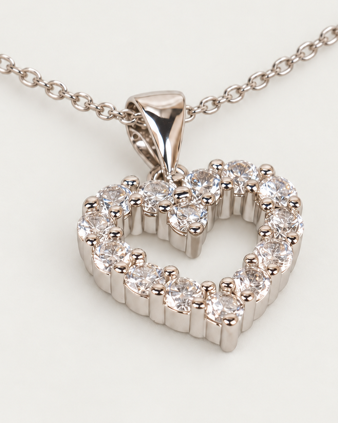 Iced Heart Silver Necklace Silver Cable Chain companion angle on neutral greige