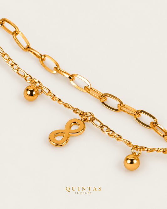 Infinity Layered Bracelet gold bracelet companion photographed angle on neutral greige