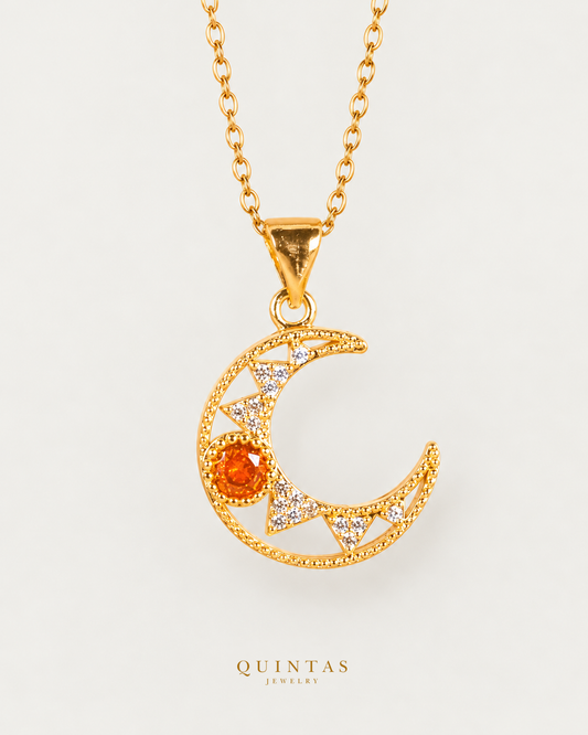 Ember Moon Necklace on gold cable chain, hero angle, neutral greige