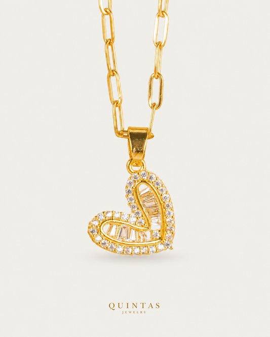 Adora Heart Paperclip Necklace — source-verified paperclip front view, off-white background, canonical gold logo